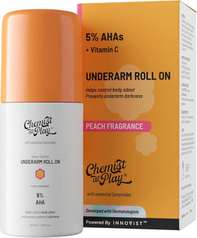 Chemist at Play on bathroom shelf with peach and towel, suggests fresh scent and daily use