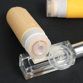 CHEODIN bottle held in hand to show 3oz scale and convenient travel sizing