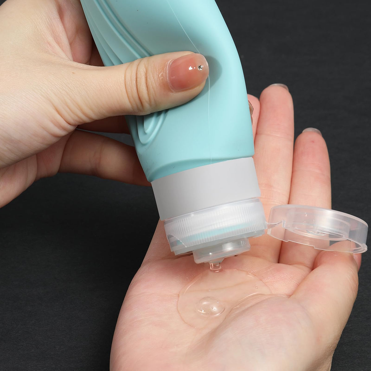 CHEODIN wide-mouth bottle opening being filled, enabling easy pouring of thick conditioners