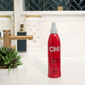 CHI spray nozzle close-up illustrating fine mist application for even heat defense