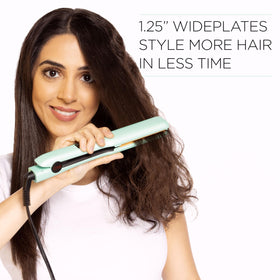 CHI styling hair with flat iron in use creating sleek straight hair quickly and efficiently benefit