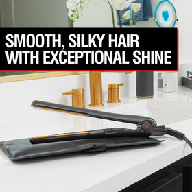 CHI flat iron styling long hair to create sleek, frizz-free results