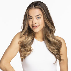 CHI G2 in hand styling long hair demonstrating fast, even straightening