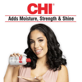 CHI application on damp hair demonstrating smoother, manageable strands