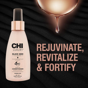 CHI spray misting on towel-damp hair demonstrating easy, even application