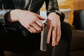 Chicago Comb in pocket demonstrating portable 5.5 inch size for travel