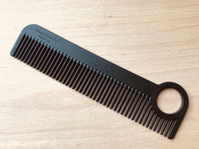 Chicago Comb loop detail emphasizing secure grip and convenient hang storage