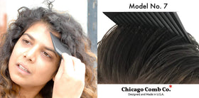 Chicago Comb Model 7 held in hand to show 6-inch scale and comfortable grip