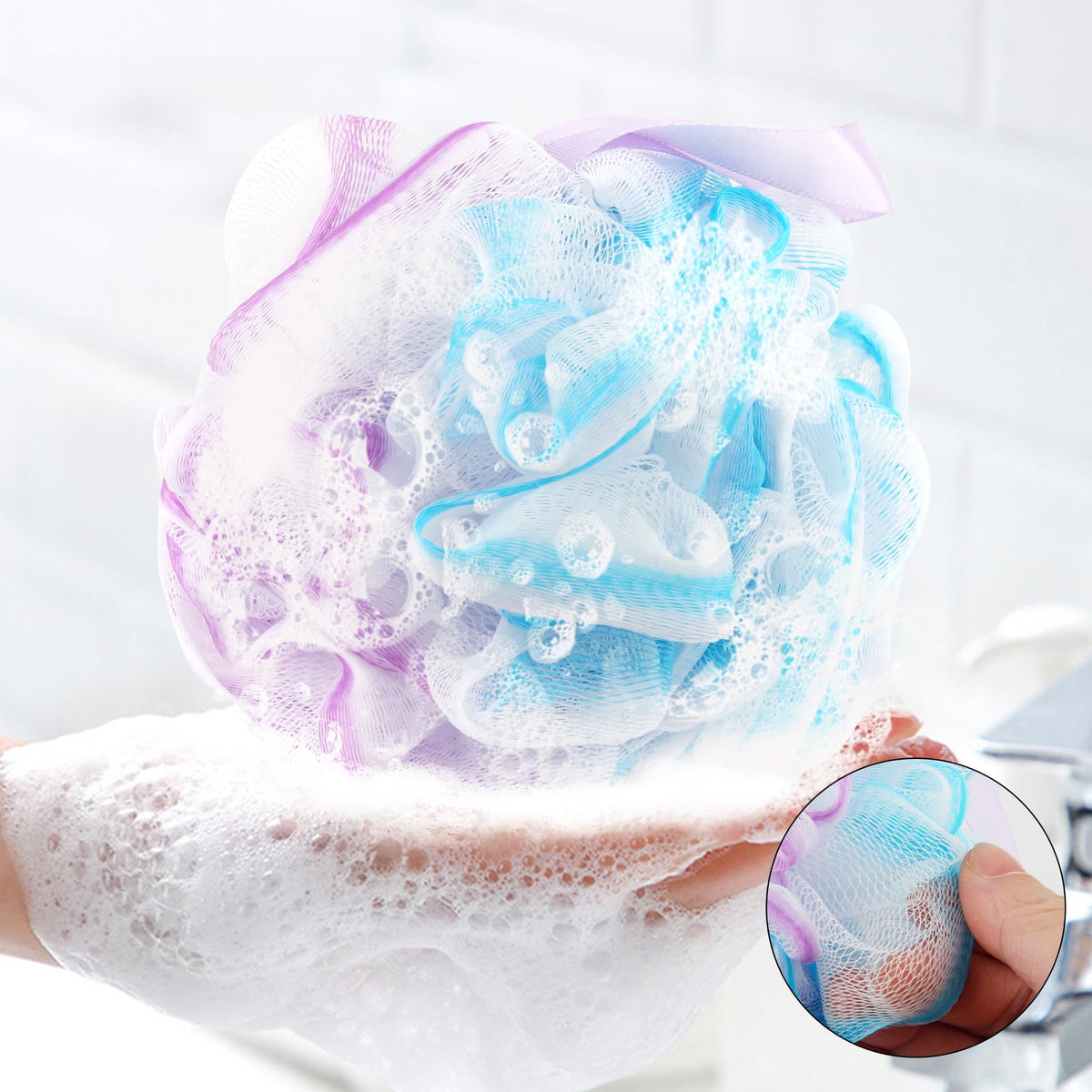 Chuya loofah held in hand showing size and comfortable grip benefit