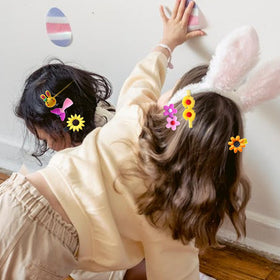 CISMARK lifestyle image at a birthday showing festive, coordinated hair accents
