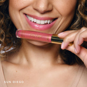 City Beauty City Lips applied on lips demonstrating immediate shine and fuller look benefit