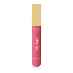 City Beauty lifestyle image of gloss in evening setting for glamorous look