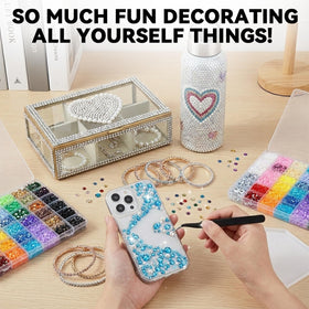 ClaBead bedazzled phone case in hand showing durable decoration