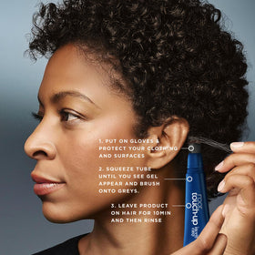 Clairol gel applied to temple area demonstrating targeted coverage for discreet blending