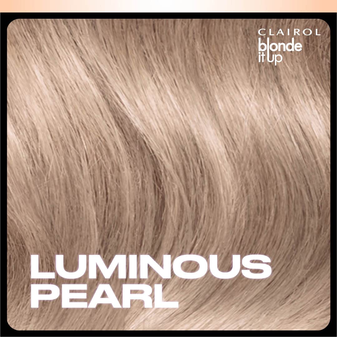 Clairol brush applying toner to blonde strands for even neutralizing effect