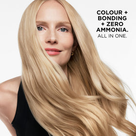 Clairol ColorStrong activator bottle pouring for even developer mixing