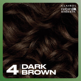 Close-up label of Clairol ingredients highlighting coconut and aloe