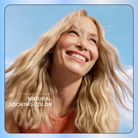 Clairol Nice'n Easy box next to a hand for size and scale reference