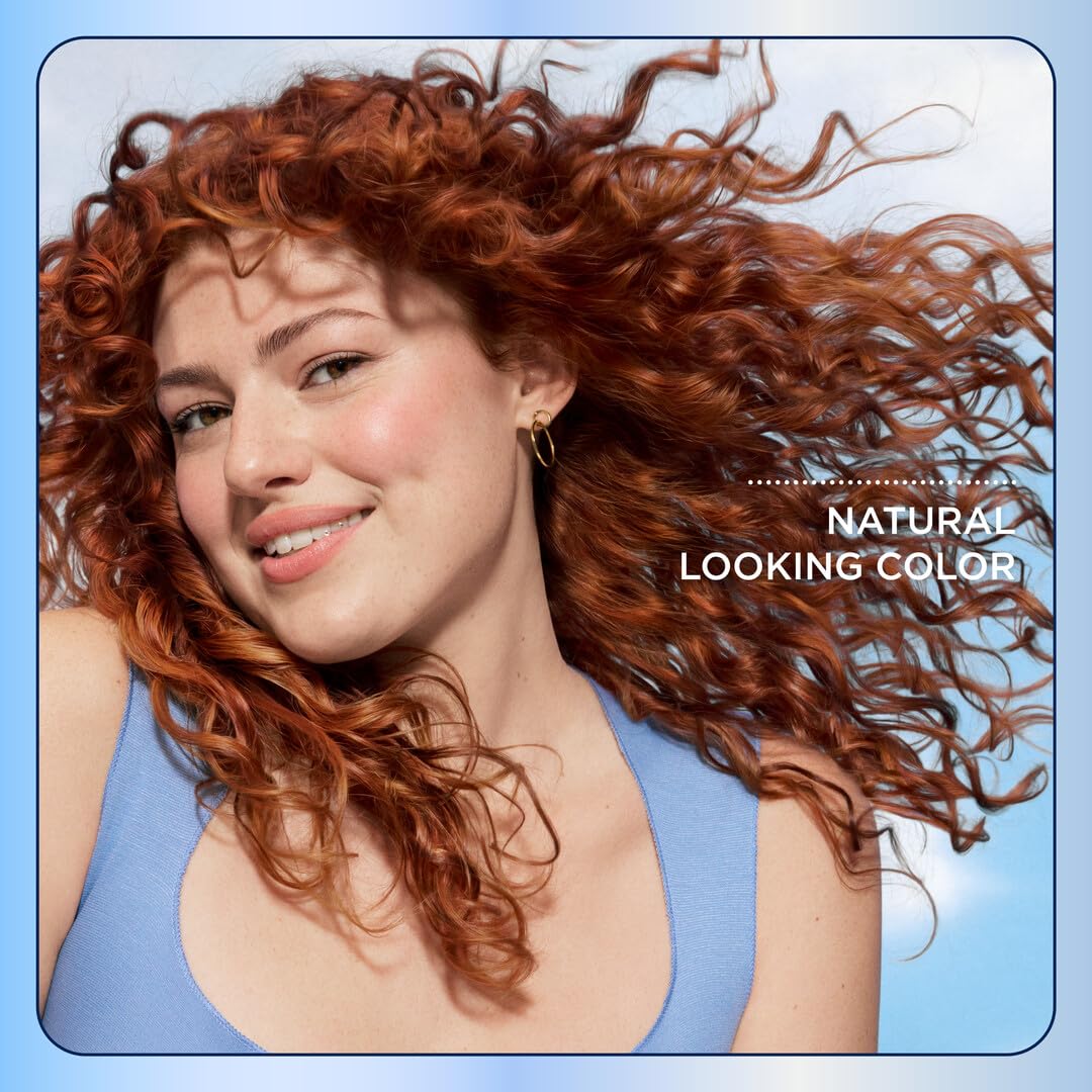 Clairol three-pack stacked to show scale and quantity for multiple applications