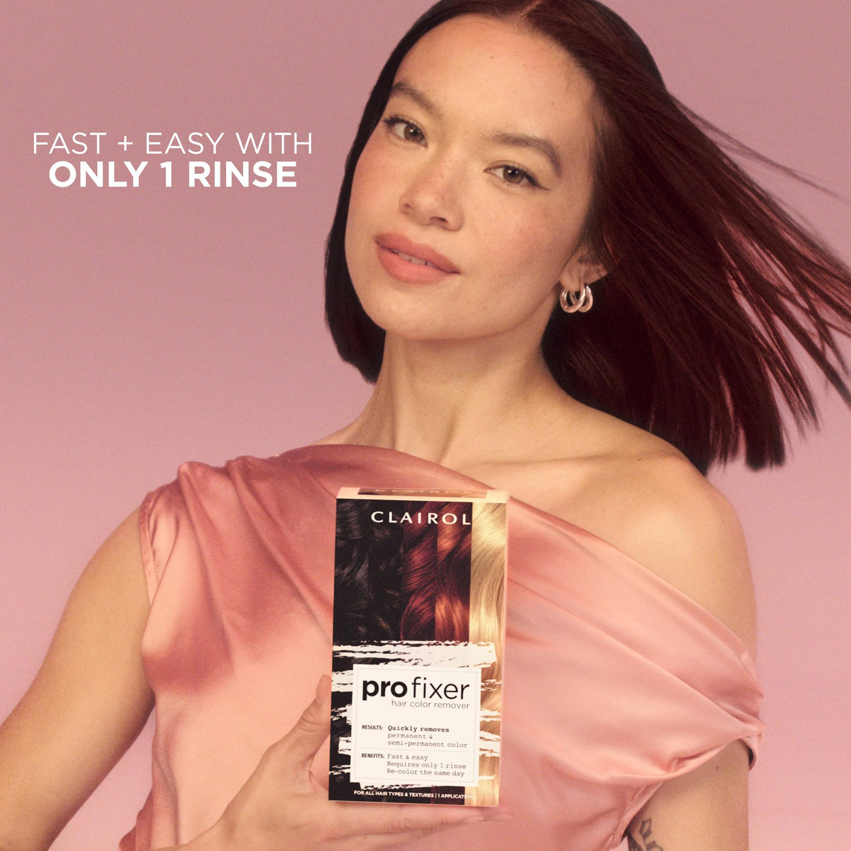 Clairol Pro Fixer kit next to hand to show scale and portions