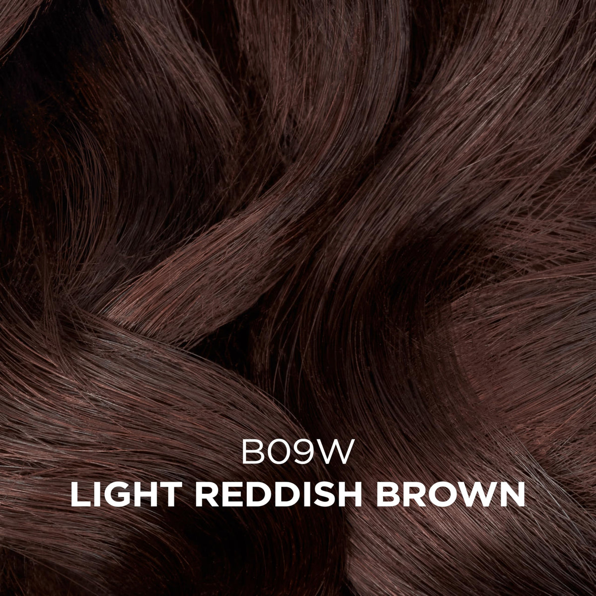 Clairol Professional color swatch on a hair strand showing natural light reddish brown tone