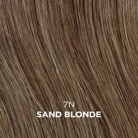 Clairol Professional being applied to curly hair for gentle gray blending