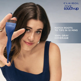 Clairol hand holding tube to show size and easy storage for at-home touch-ups