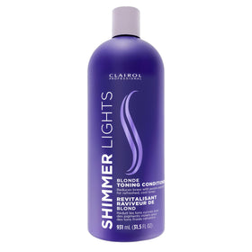 Clairol Professional front packaging of large purple conditioner, instant toning benefit