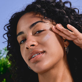 Clarins application on face with pressing motion for even coverage and smooth finish
