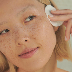 Clarins product label close-up showing plant-based ingredient list