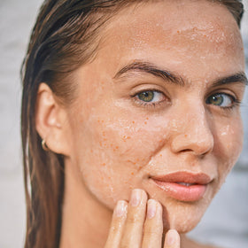 Clarins cleanser on bathroom sink as part of routine showing quick daily radiance boost