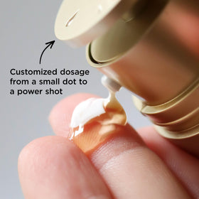 Clarins Double Serum Eye held in hand demonstrating compact size and travel convenience