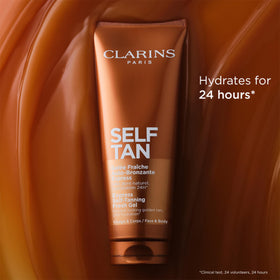 Clarins fig and aloe ingredients on flatlay for hydrated skin
