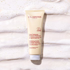 Clarins rinsing face showing clean, refreshed skin after use