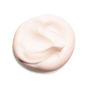 Clarins close-up of creamy texture highlighting rich shea and mango nourishment