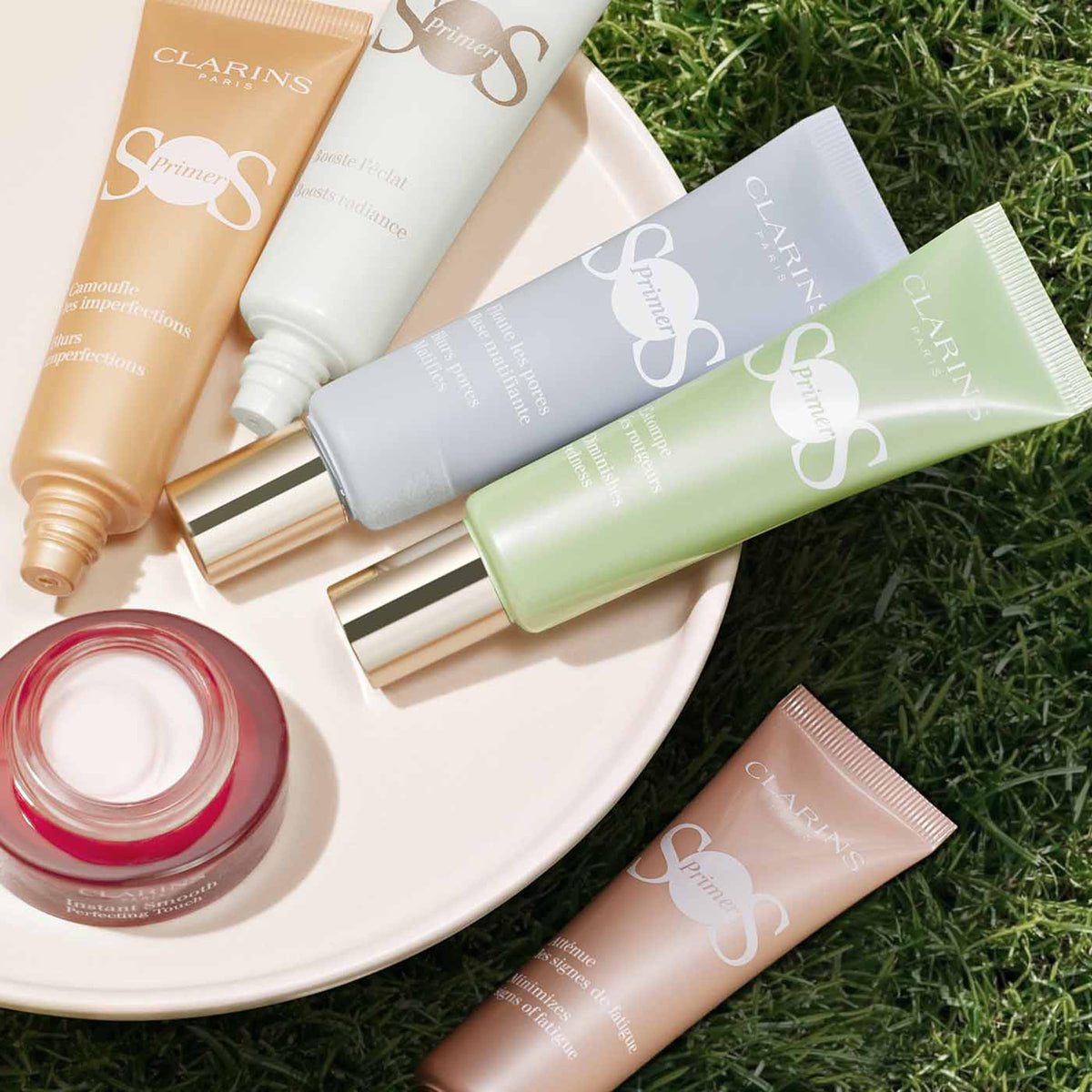 Clarins product packaging label close-up highlighting ingredients and clear directions benefit