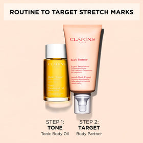 CLARINS tube in hand showing size and travel-friendly benefit