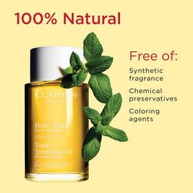 Clarins oil applied to abdomen illustrating firming massage benefit