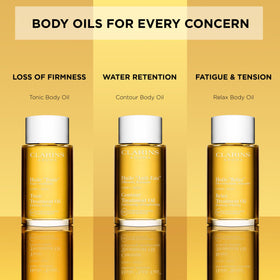Clarins ingredients display featuring hazelnut oil for nourishing benefit