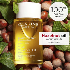 Clarins pump dispensing oil drop demonstrating easy application benefit