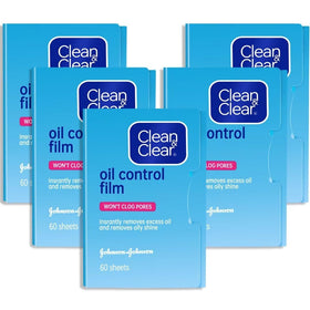 Clean & Clear front packaging showing compact oil control sheets benefit instant shine removal
