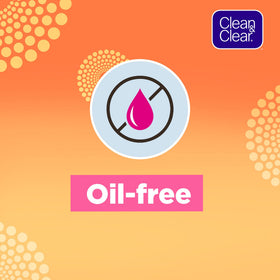 Clean & Clear scrub beside tangerine slice highlighting fresh scent