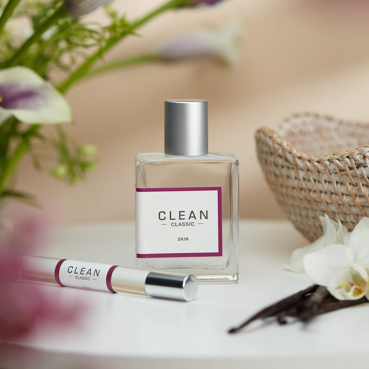 CLEAN flatlay with travel items showing portable scent for on-the-go use