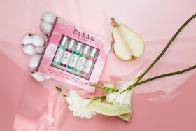 CLEAN lifestyle scene outdoors with rollerballs on a picnic showing mood-lifting portability benefit