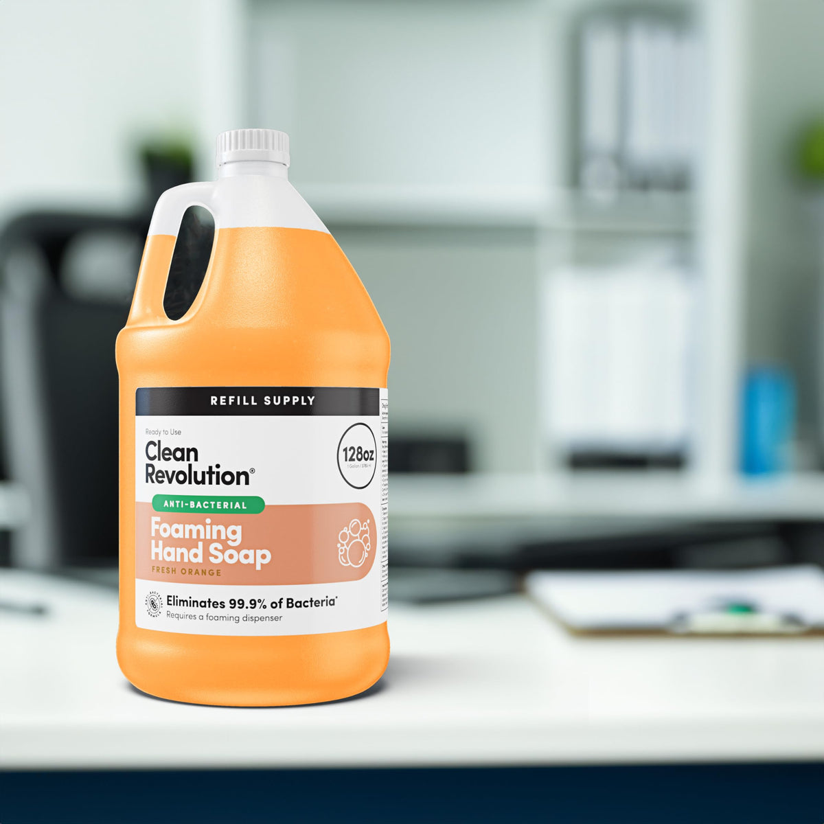 Clean Revolution pouring refill into a foaming dispenser for quick, easy refill