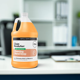 Clean Revolution pouring refill into a foaming dispenser for quick, easy refill