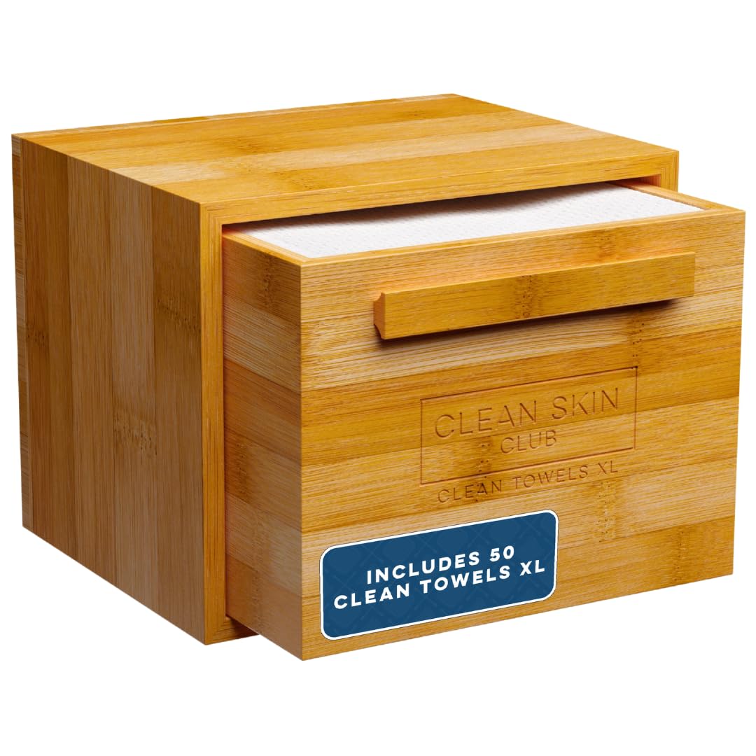 CLEAN SKIN CLUB bamboo container front view shows sleek storage and organized counter benefit