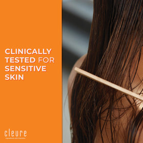 Before and after hair photo with Cleure showing improved smoothness and detangling benefit