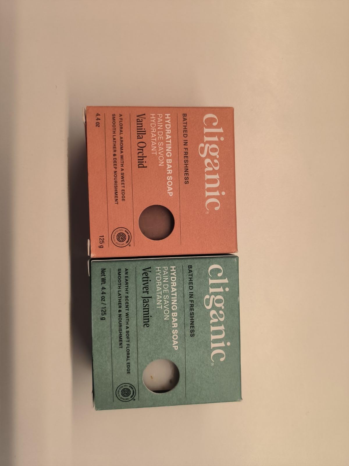 Cliganic bar resting on draining soap dish to extend bar lifespan