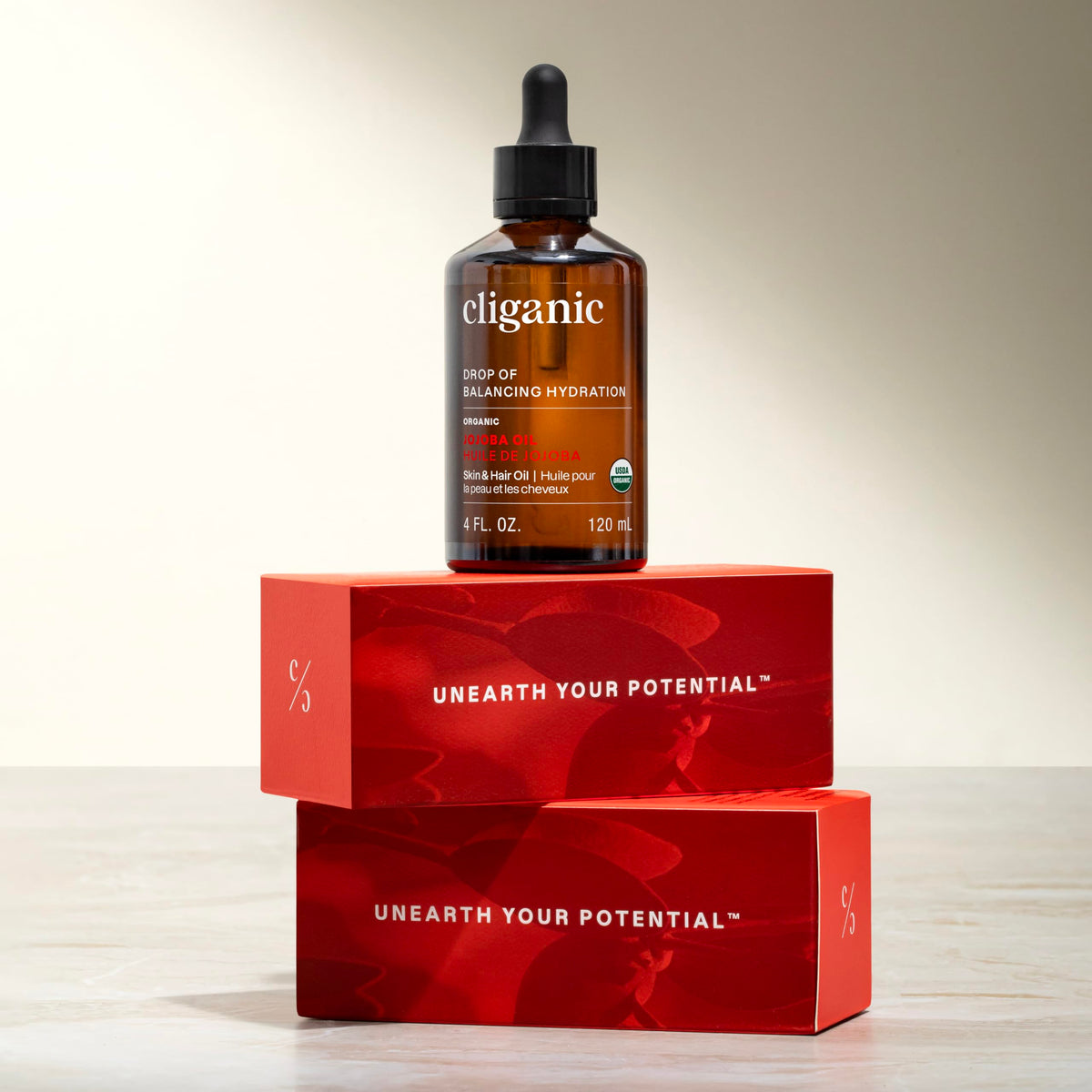 Cliganic jojoba oil on bathroom shelf in lifestyle setting — daily routine enhancement benefit